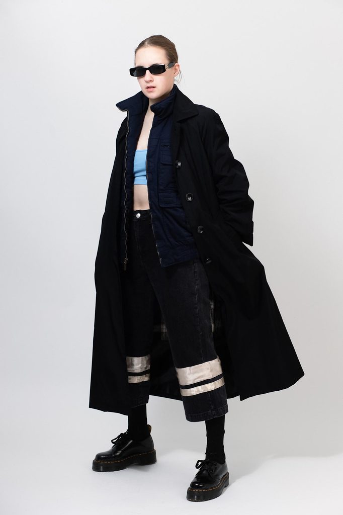 Fashion-inspired studio portrait on a light background